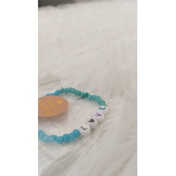 Pulsera azul con frase de love (en el precio no están incluidos los gastos de envio)