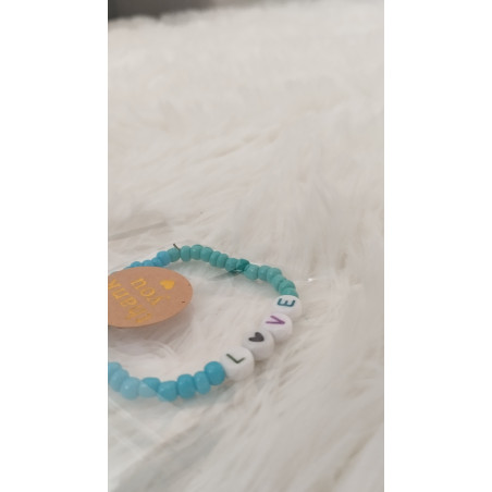 Pulsera azul con frase de love (en el precio no están incluidos los gastos de envio)