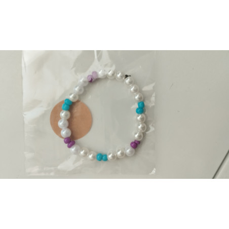 Pulsera de perlas y bolitas azules y moradas (en el precio no están incluidos los gastos de envio)